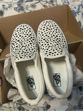 Vans Women Slip-On Sneakers in White with Black Dalmatian Print